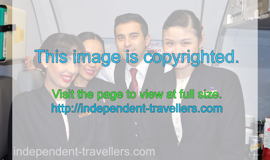 A charming crew of flight attendants of Qatar Airways﻿