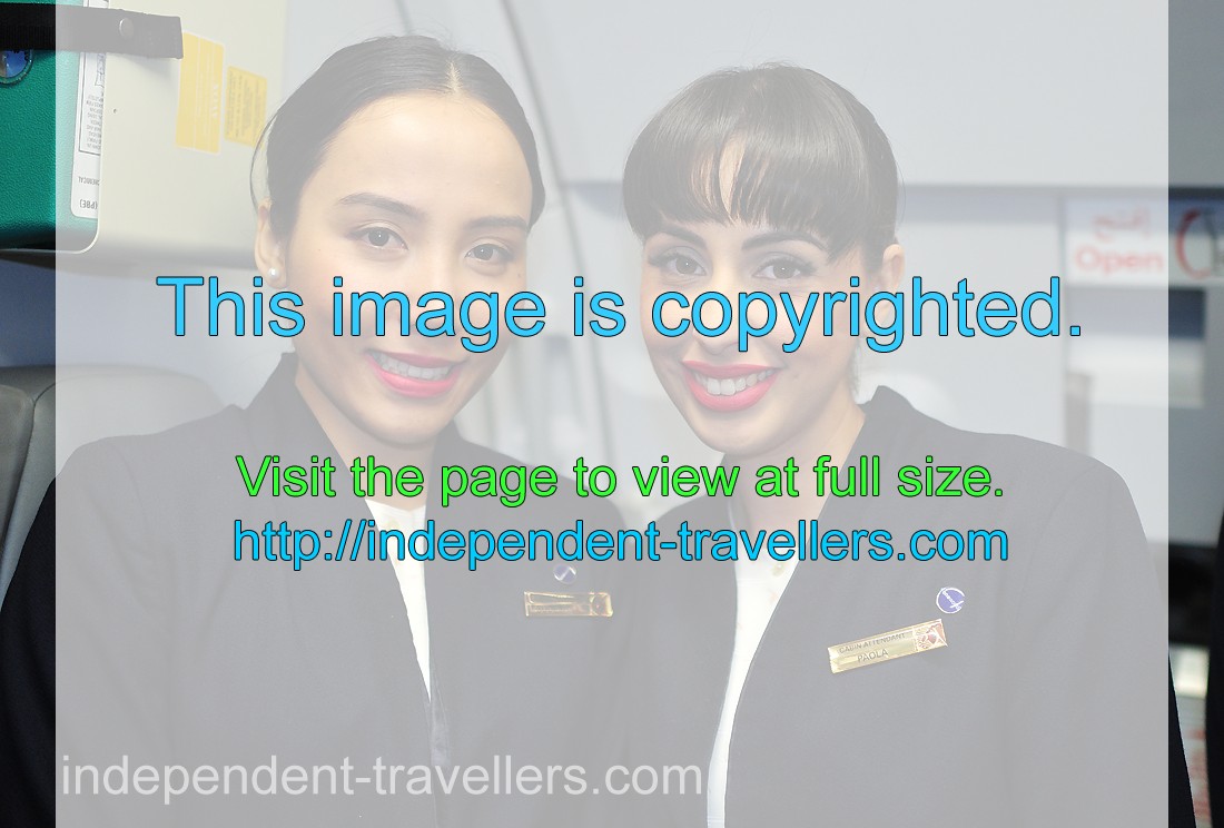 These two beautiful flight attendants work in Qatar Airways