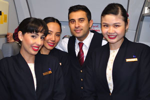 A charming crew of flight attendants of Qatar Airways﻿