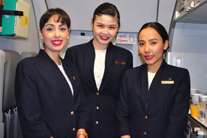 Three captivating flight attendants
