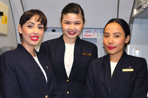 Three good-looking flight attendants