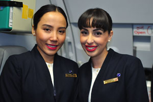 These two beautiful flight attendants work in Qatar Airways