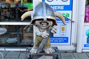An Iceland troll sculpture dressed up as viking