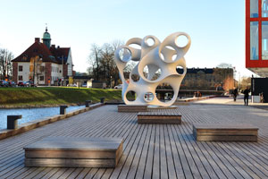 The white-painted aluminum sculpture Rubato has the dimension of 6x7 meters