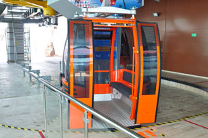 The cable car carrier #8 moves around the upper station