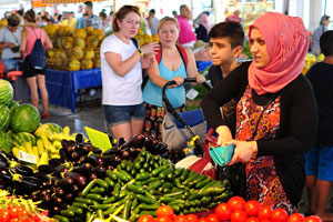 Turkish customers are at the vegetable market