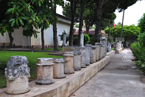 Ancient altars are situated along the paved footpath