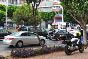 A police motorcycle is parked near the scene of an accident, this place is not far from the museum
