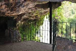 There is a natural cave behind the falls for onlookers to peer through