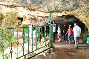 There is a path inside the cave which leads to the area behind the waterfall