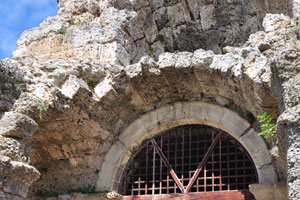The massive door is at entrance to the ancient theatre of Side