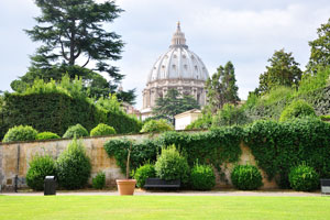 The dome of St. Peter's Basilica as seen from the Square Garden