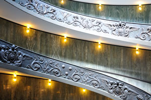 The balustrade around the ramp of Bramante Staircase is made of ornately worked metal