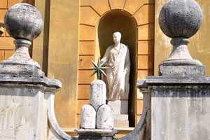 A statue of a man in the Cortile della Pigna