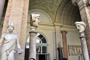 Columns are crowned with the carved heads in the Octagonal Courtyard
