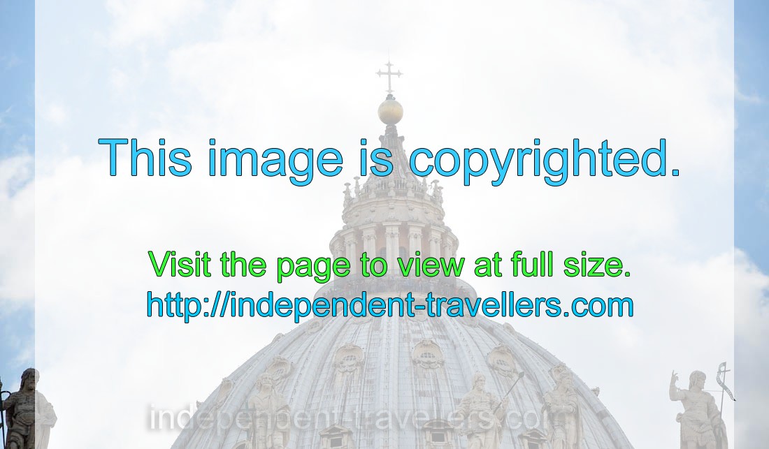 Numerous tourists are on the top of the dome of St. Peter's Basilica
