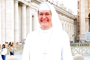 A christian woman from the Vatican is laughing out loud