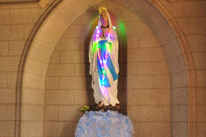 The statue of Our Lady of Fatima inside St. Mary's Cathedral Basilica is decorated with multicolored lights