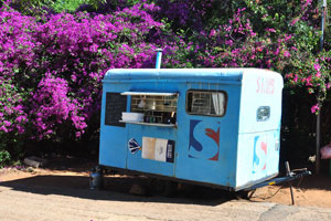 The mobile coffee van is located beside Caravan Park Chalets & Campsite