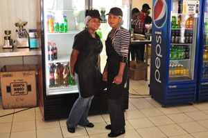 Two charming Zimbabwean girls work at Mac's Pies restaurant