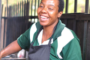 A lovely Zimbabwean woman works in the Invuvu Bar